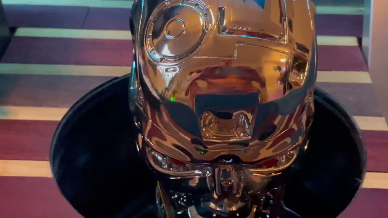 A chrome skull — the cradle that holds the Nanowave helmet between sessions